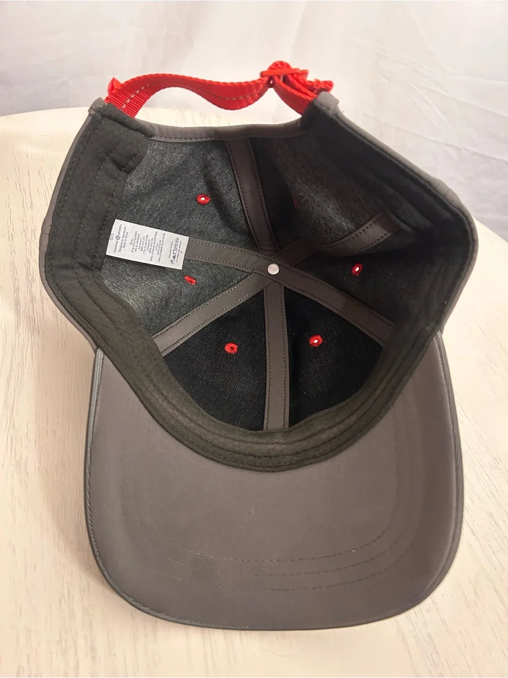 lululemon athletica Gray Cap with Red Eyelets